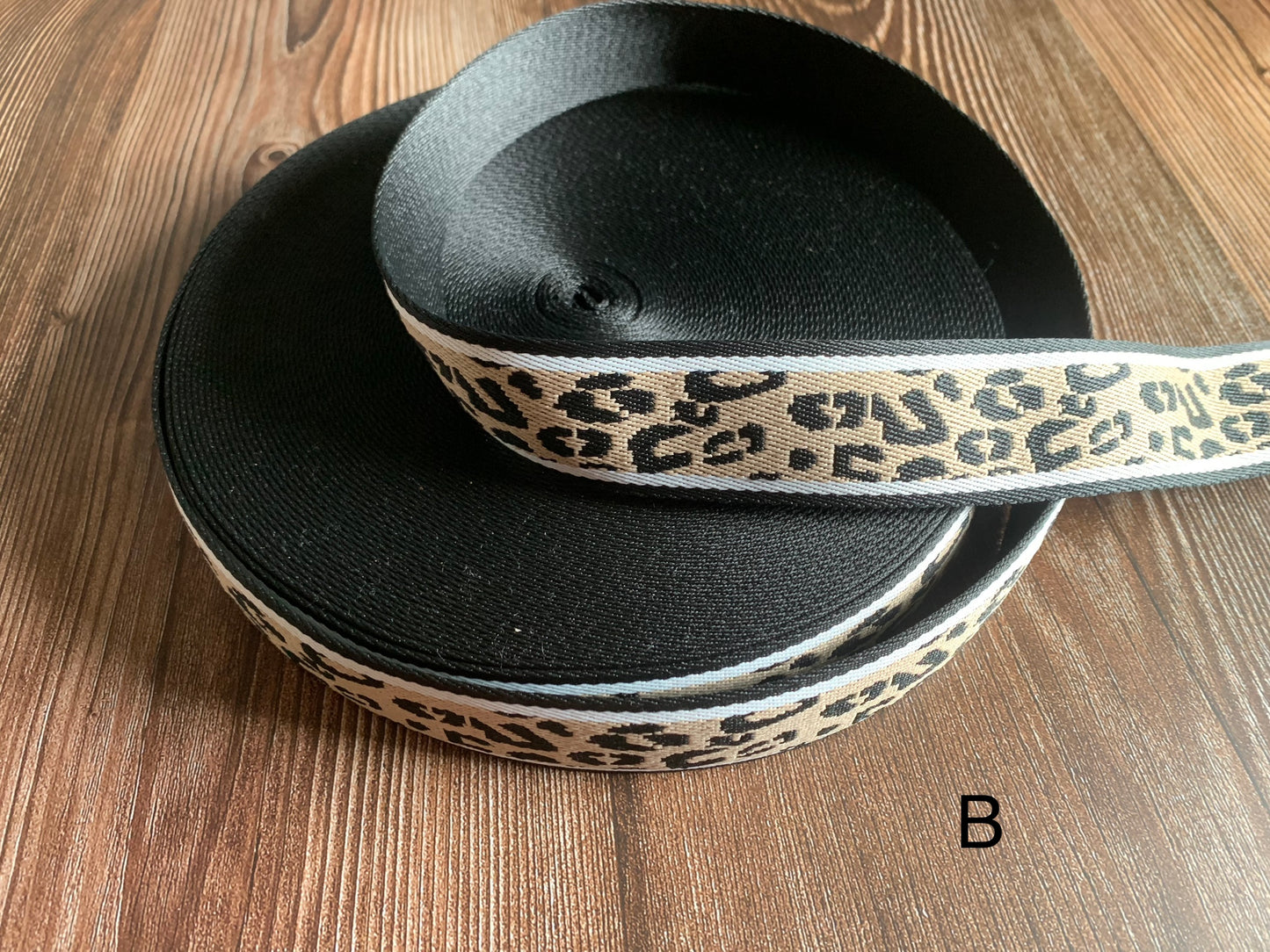 3.8cm/1.5 inch patterned webbing sold by 3m rolls.