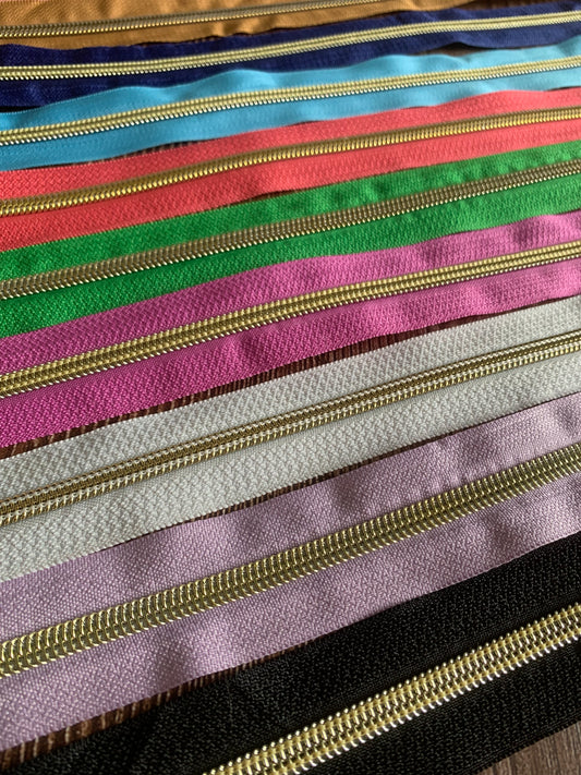 Gold teeth nylon zipper tapes by the metre - size 5 G4