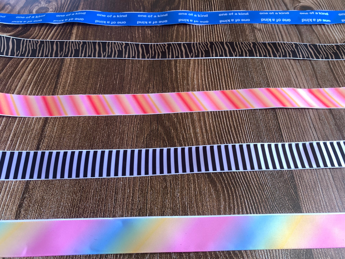 Self adhesive/smackdown binding tapes