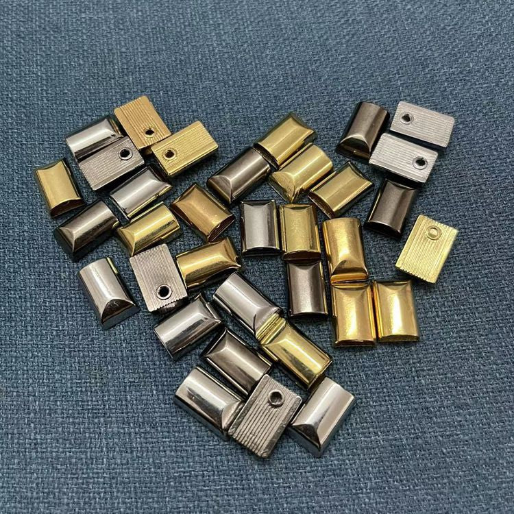 Metal zipper ends for bag making etc.