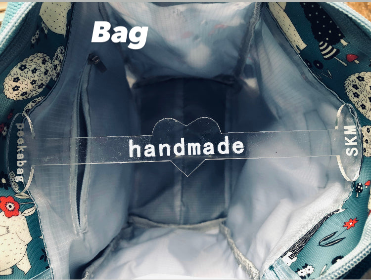 Peekabag, bag and wallet props, openers for interior display and photography