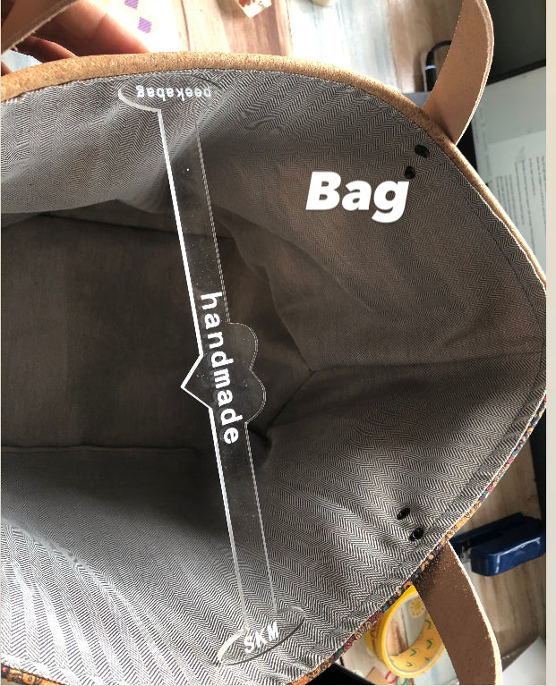 Peekabag, bag and wallet props, openers for interior display and photography