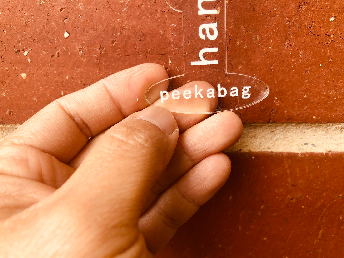 Peekabag, bag and wallet props, openers for interior display and photography