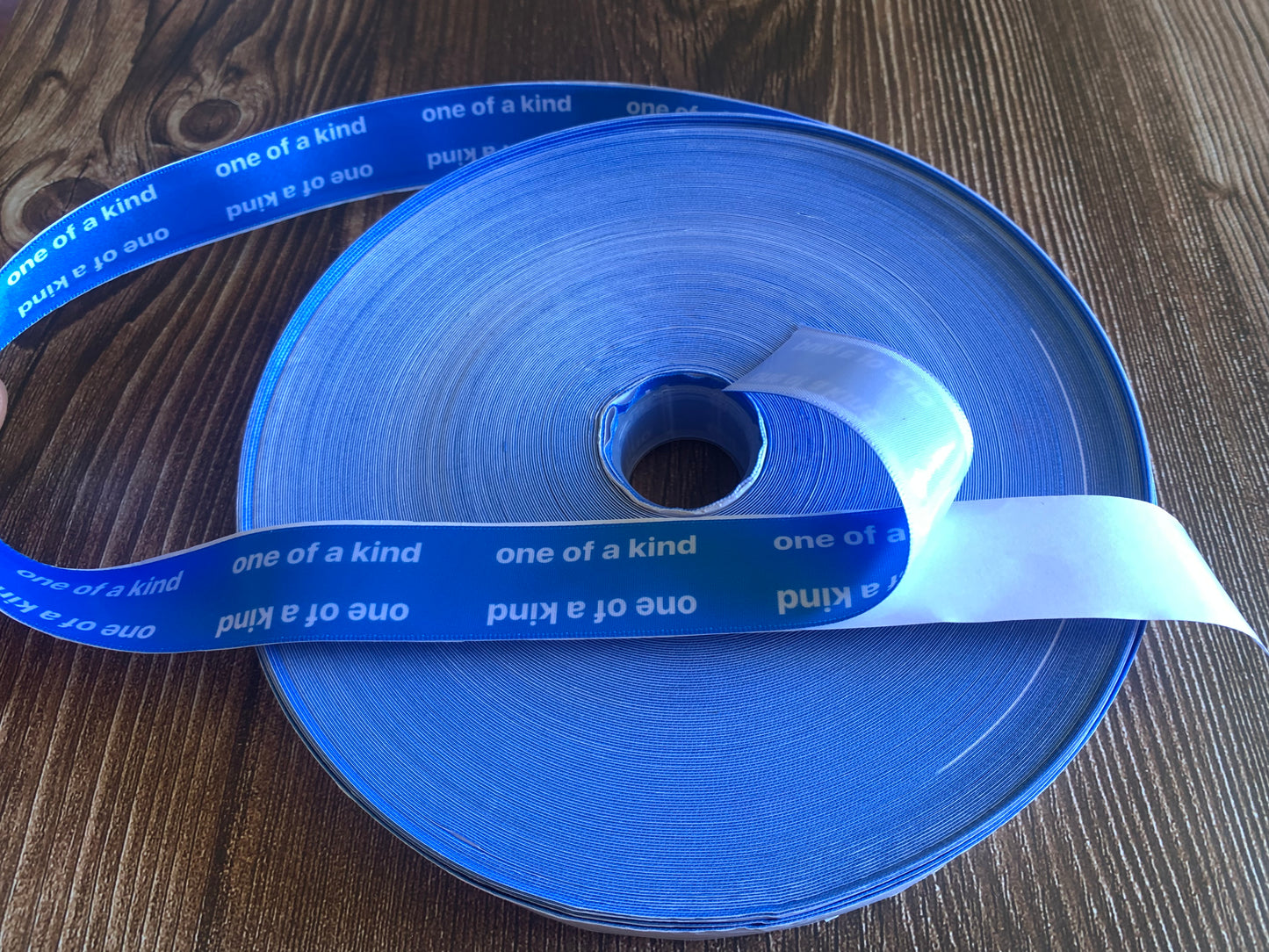 Self adhesive/smackdown binding tapes