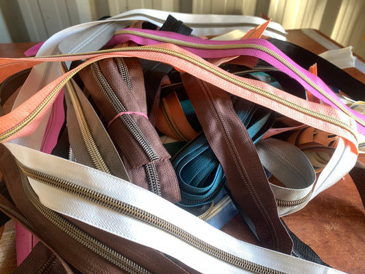 Mixed zipper tapes