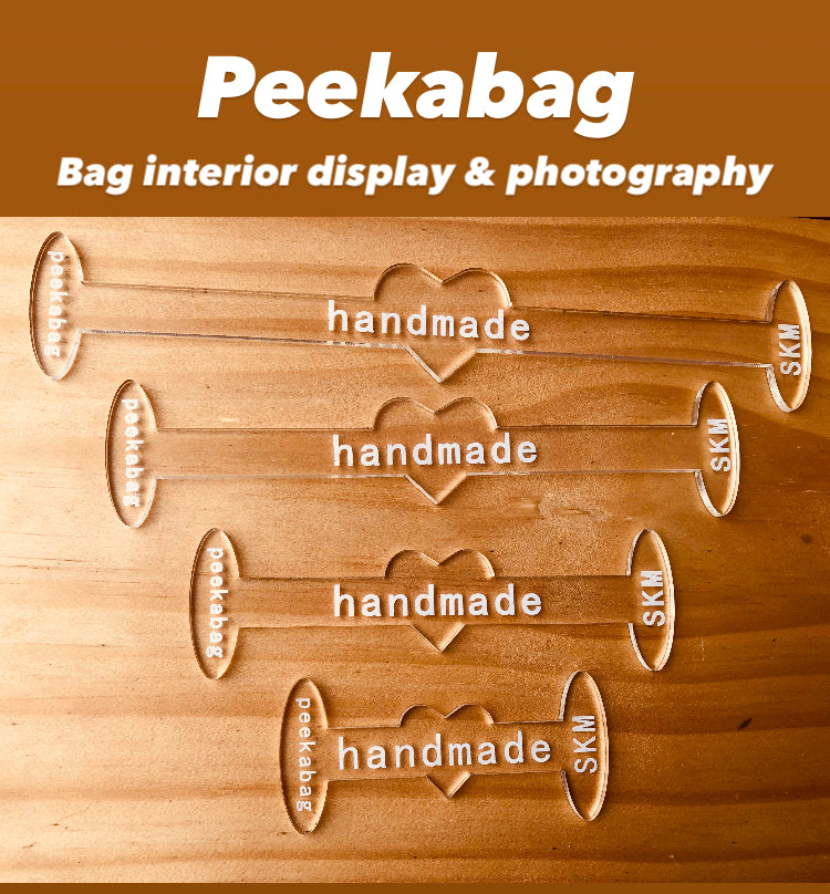 Peekabag, bag and wallet props, openers for interior display and photography