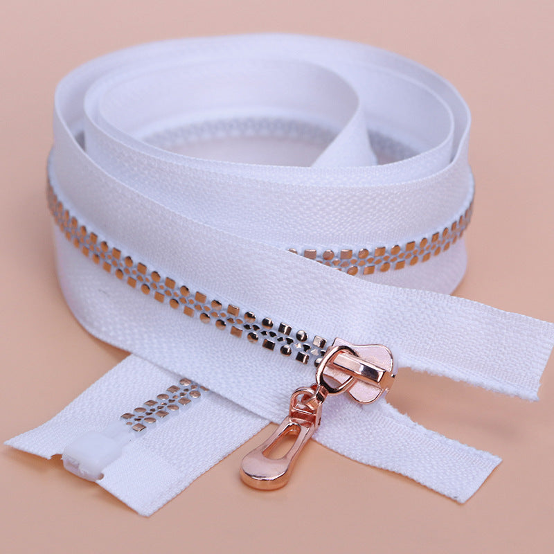 Size 5 rose gold color zippers, black and white zipper tape with rainbow teeth, zips for jackets, hoodies and bags